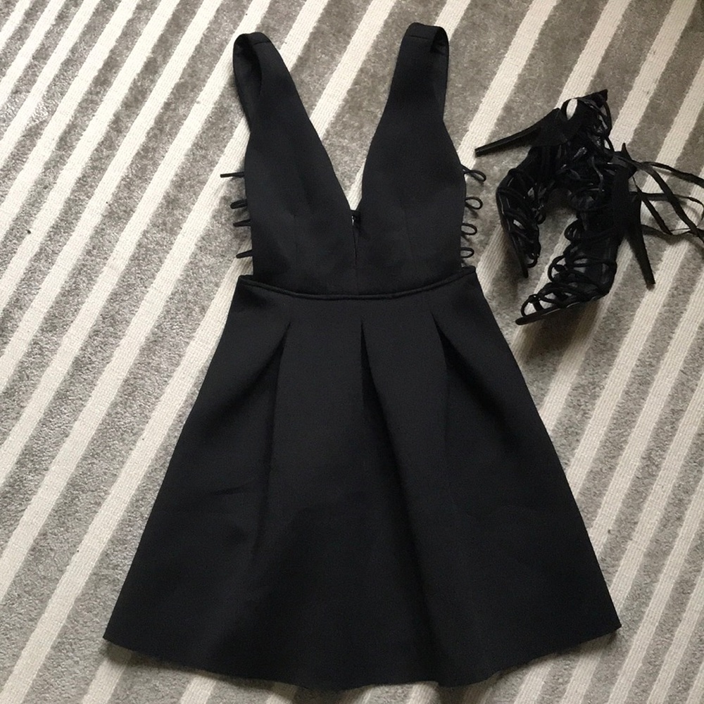 Super cute LBD, deep V with cut outs on side